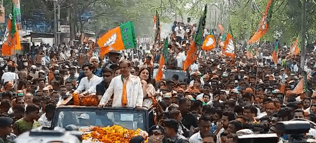 Sea of supporters: Himanta Biswa Sarma leads a mega rally ahead of nomination filing, son and wife a