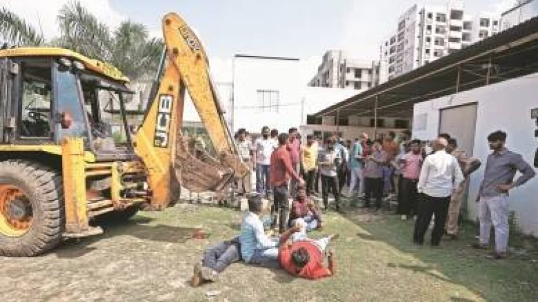 AAP workers protest after bulldozers arrive at Vadodara property where Arvind Kejriwal held event