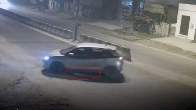 A woman dragged by car after hitting; 5 men arrested
