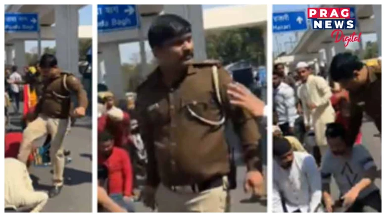 ৰাজপথত নামাজ পঢ়ি থকা লোকক আৰক্ষীৰ গোৰ! দিল্লীত  নিলম্বিত আৰক্ষী বিষয়া