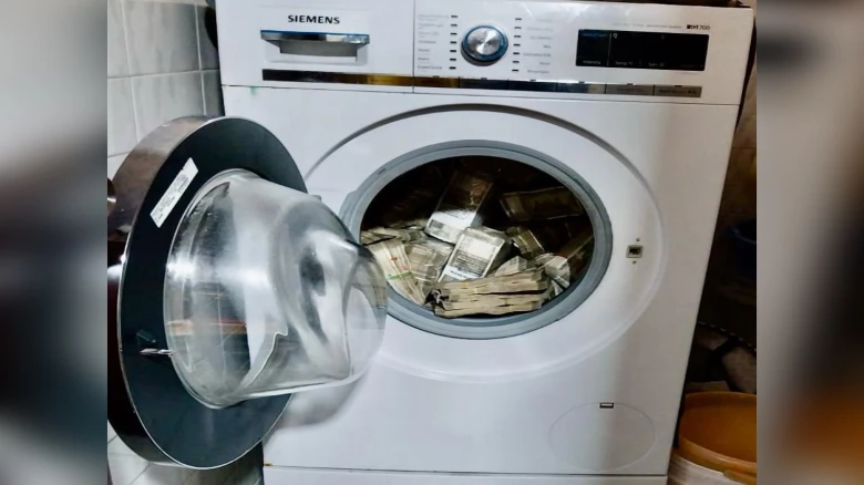 ED seizes crores in cash from washing machine during searches