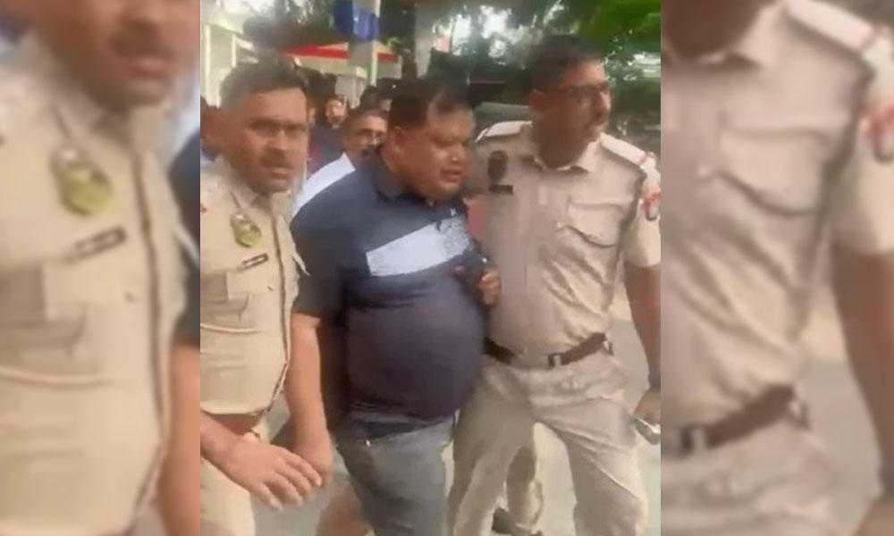 Man Detained as Viral CCTV Footage Shows Him Sharing Money Collected from Railway Job Seekers