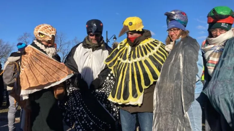 Activists dressed as birds and trees rally for nature at COP15 in Montreal