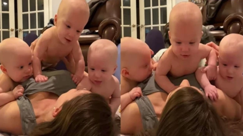 An endearing video of a mother cuddling her triplets went viral on Social Media; Watch Here