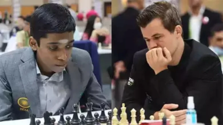 Carlsen showing appreciation for Praggnanandhaa at end of draw